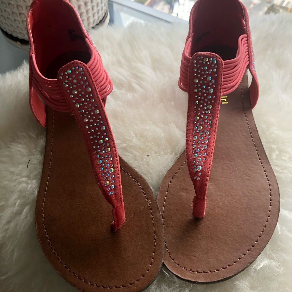 Steve Madden coral studded thong sandals.